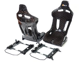 Forged CF GT-Max Seats with rails and slider kit for Audi RS7.
Black Alcantara padding with orange honeycomb stitching pattern.