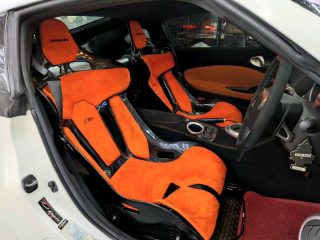 Cf Seats GT-Max with orange Alcantara padding + plug&play rails and slider kit in Fairlady 370Z.