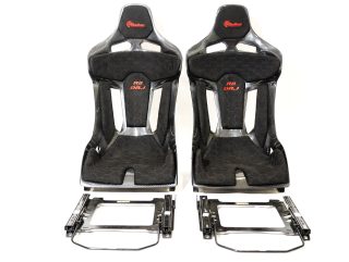 Rise to new heights with KevMannz's Carbon Fiber Bucket Seats, expertly crafted with GT-Max, Audi R8 plug&play rails and a slider kit.
Amplify your drive with bespoke black Alcantara padding, featuring a refined honeycomb stitching pattern and subtle logo embroidery on the headrest and backrest padding, and discover a driving experience that's truly elevated.