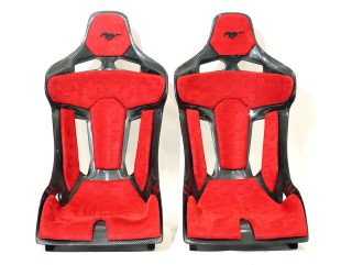 KevMannz GT-Max, full carbon fiber bucket seats, featuring vibrant red Alcantara padding, bold Mustang logo embroidery, and intricate honeycomb stitching - where performance meets limitless possibility! 💪